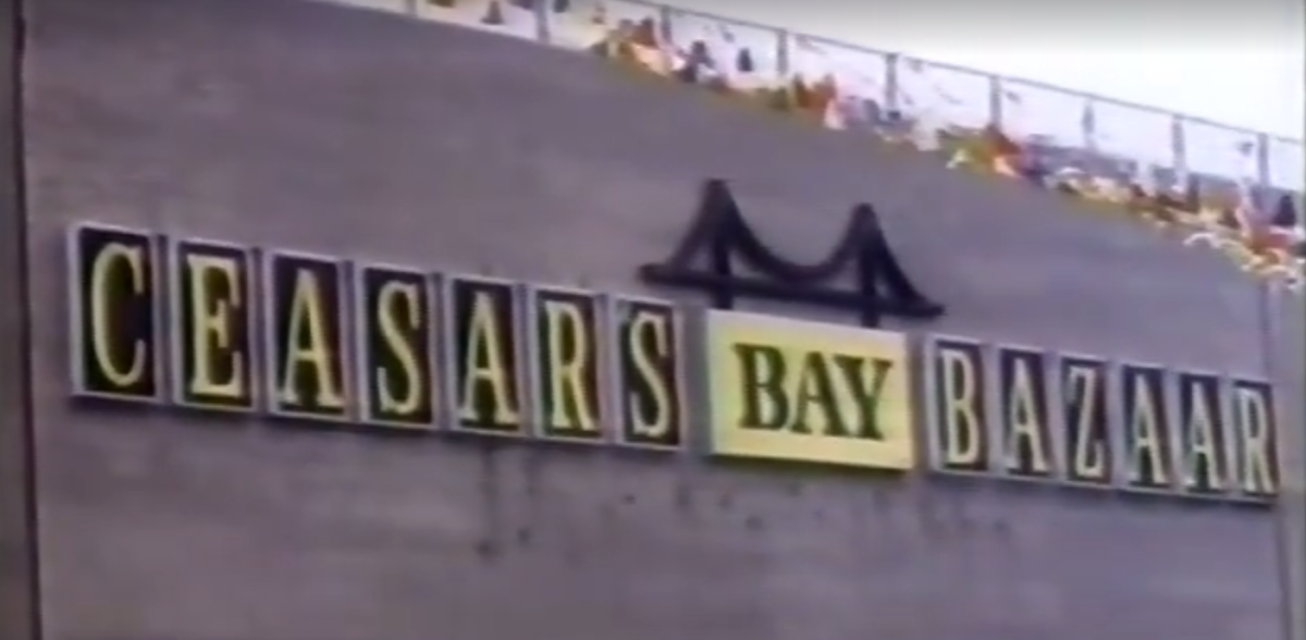 Caesar's Bay Bazaar signage and building — historical photograph